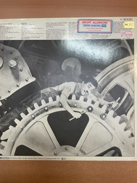 Vinyle Charlie Chaplin "Modern Times" Bande originale du film 3000 partitions, livres et vinyles d'occasion en vente sur notre site internet gastonmusicclub.fr Gaston Music Store