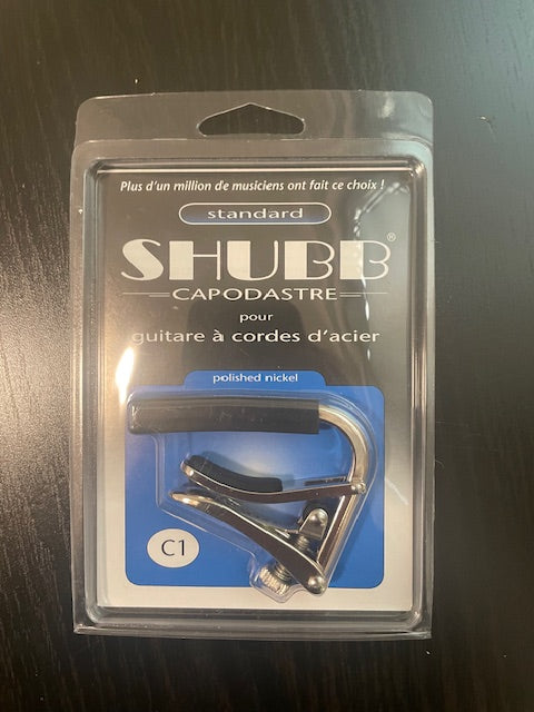 Capodastre Shubb C1 standard pour guitare à cordes d'acier-3000 partitions, livres et vinyles d'occasion en vente sur notre site internet gastonmusicclub.fr Gaston Music Store