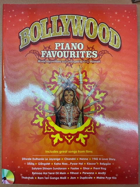 Bollywood piano favorites includes great songs from films. CD Inclus partition piano voix guitare